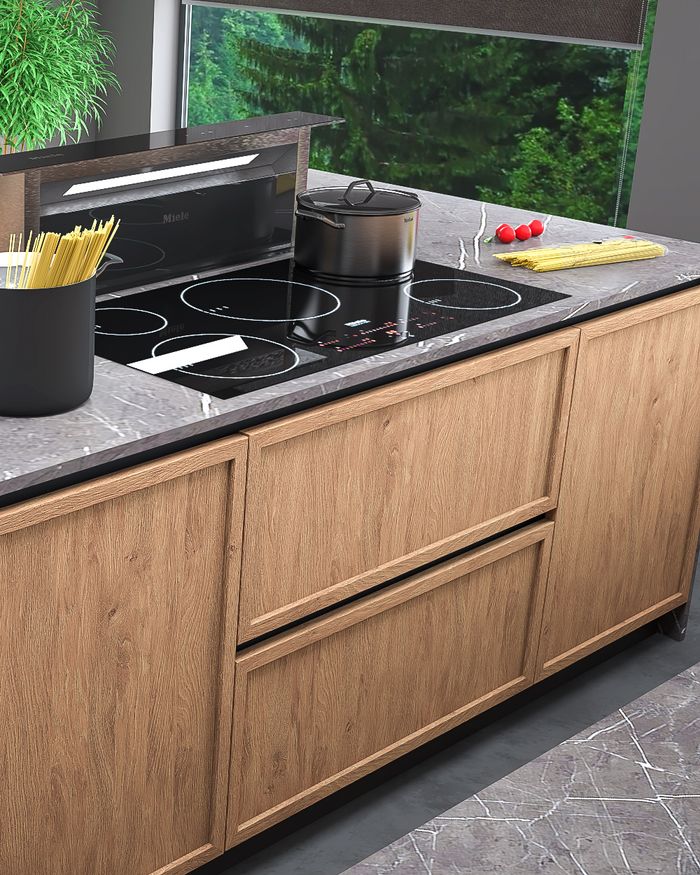 La cuisine RING présente une plaque de cuisson en céramique noire combinée à des tiroirs en bois, créant un espace de cuisson impressionnant et pratique.