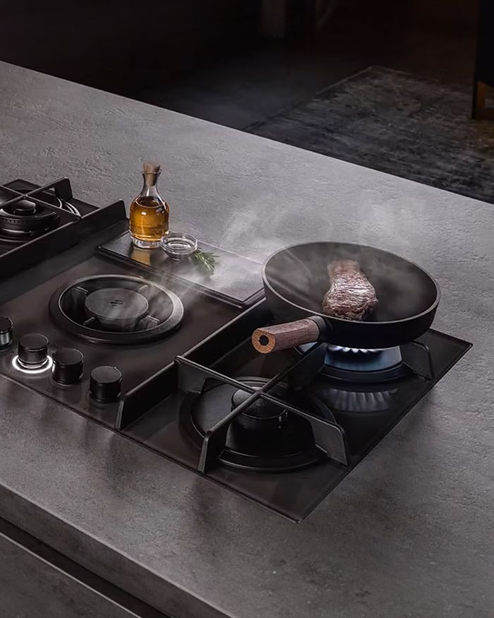 Mebel Arts presents the innovative Elica Nikola Tesla cooktop, with impeccable design and superior functionality, showcasing the art of cooking.