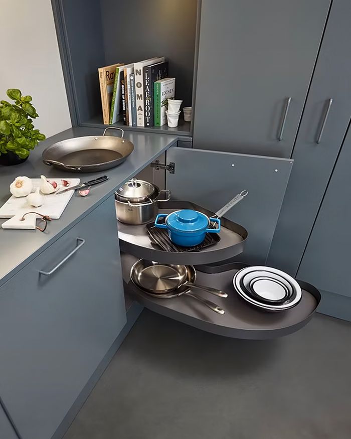 Image showing the Cornerstone MAXX corner storage solution by Vauth-Sagel in actual use within a modern kitchen, demonstrating the flexibility and aesthetics it offers to the space.