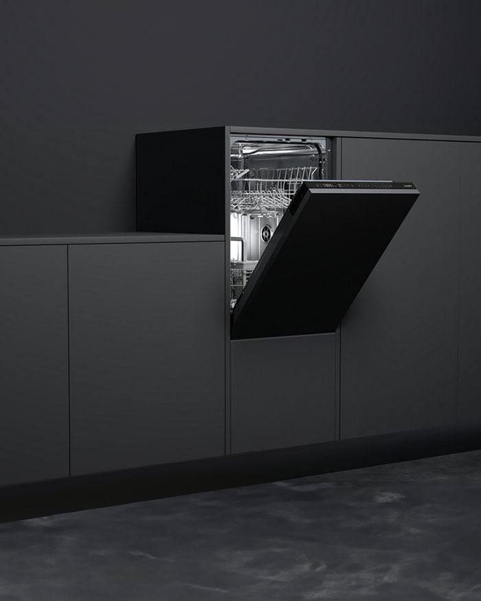Black elevated Mebel Arts dishwasher in a minimalist kitchen design.