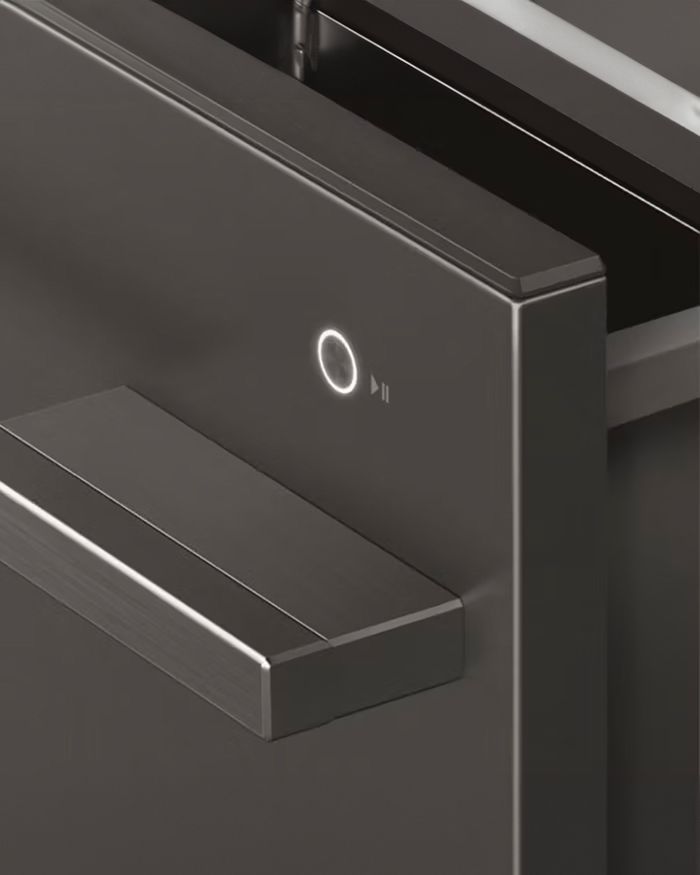 Modern dishwasher with drawers by Mebel Arts, integrated into an elegant black kitchen with handle details.