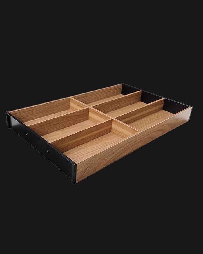 The walnut Ambia-Line cutlery tray by BLUM for Mebel Arts kitchens combines elegance and functionality