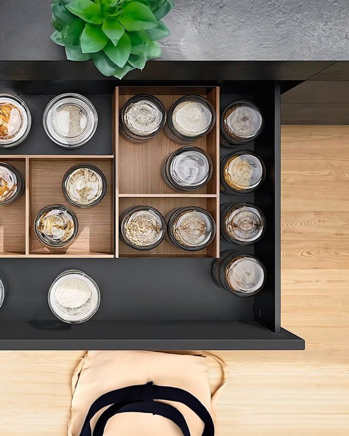 Drawer dividers Ambia Line by BLUM with spices, offered by Mebel Arts for harmonious organization.