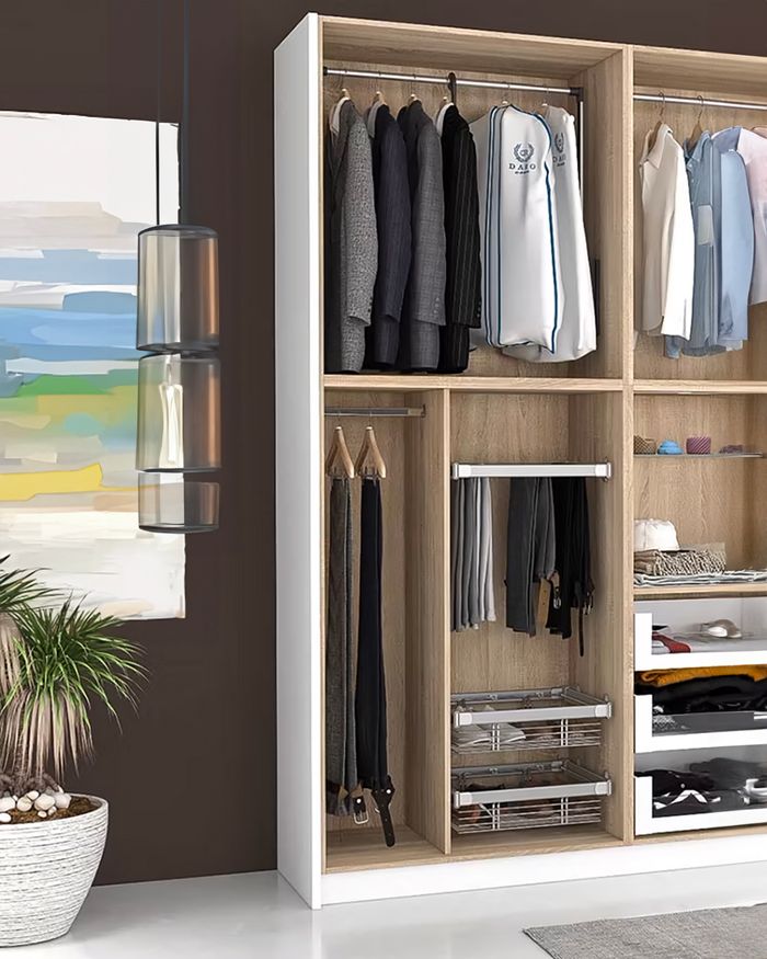 Wooden ORION wardrobe from Mebel Arts in a combination of brown and white colors, offering a modern aesthetic to your space. The tasteful design and practical layout with multiple hanging rails, drawers, and shelves provide ample space for organized storage. An excellent choice for those who wish to combine functionality with modern design in their personal space.