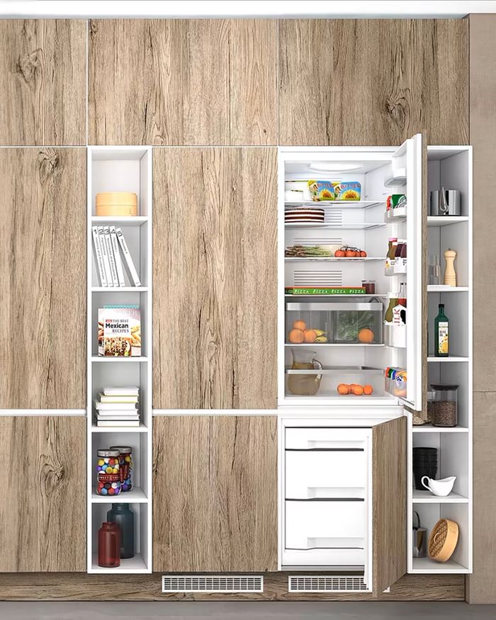 Inbuilt refrigerator in Mebel Arts Tamo kitchen with a modern aesthetic.