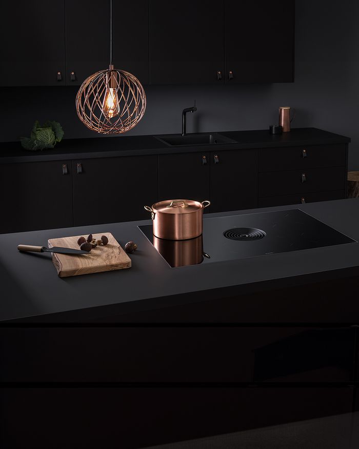 Elevate cooking with the sleek BORA X PURE cooktop in Mebel Arts' modern kitchen design.