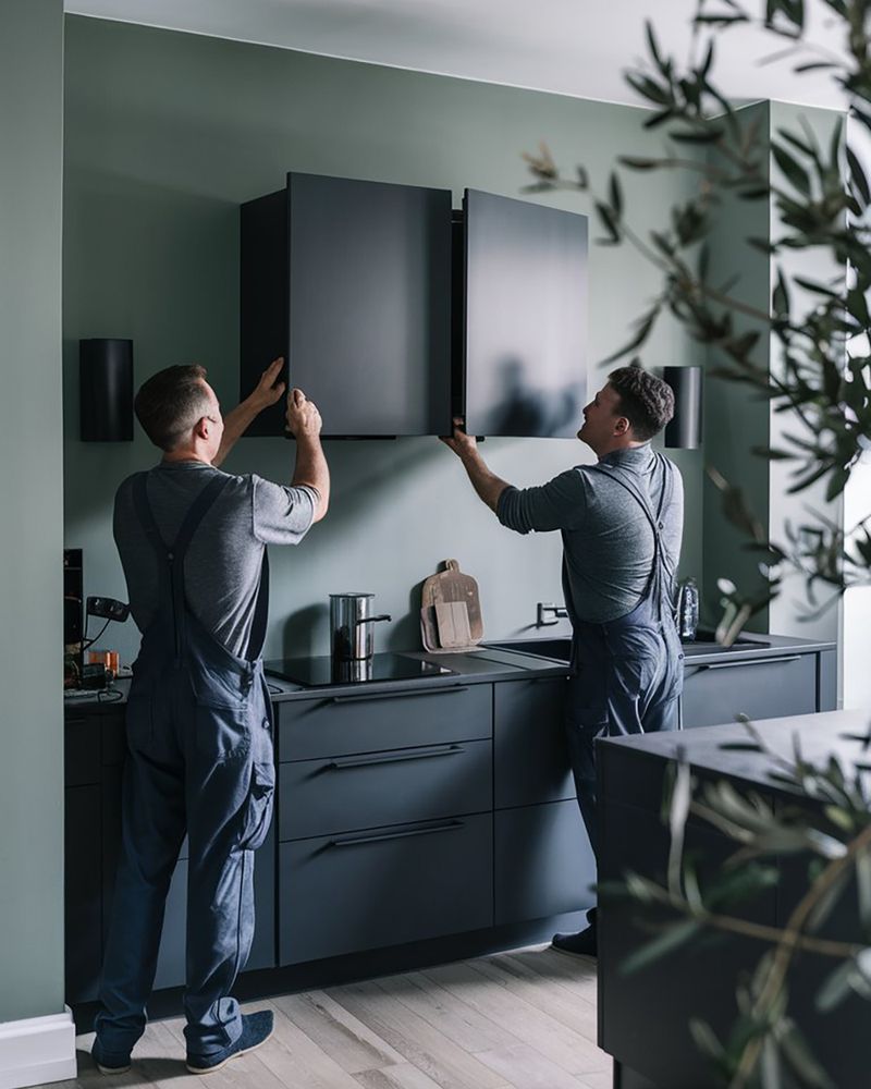 Modern black kitchen installed by skilled craftsmen