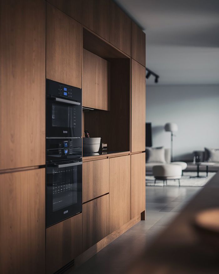 Kitchen furniture with wood veneer and integrated appliances. Ideal for modern kitchens from Mebel Arts.