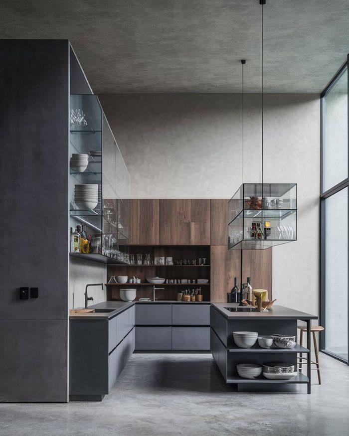 Modern kitchens with gray cabinets and open shelves. Wooden wall paneling, glass elements, and a comfortable island with storage spaces. Mebel Arts.