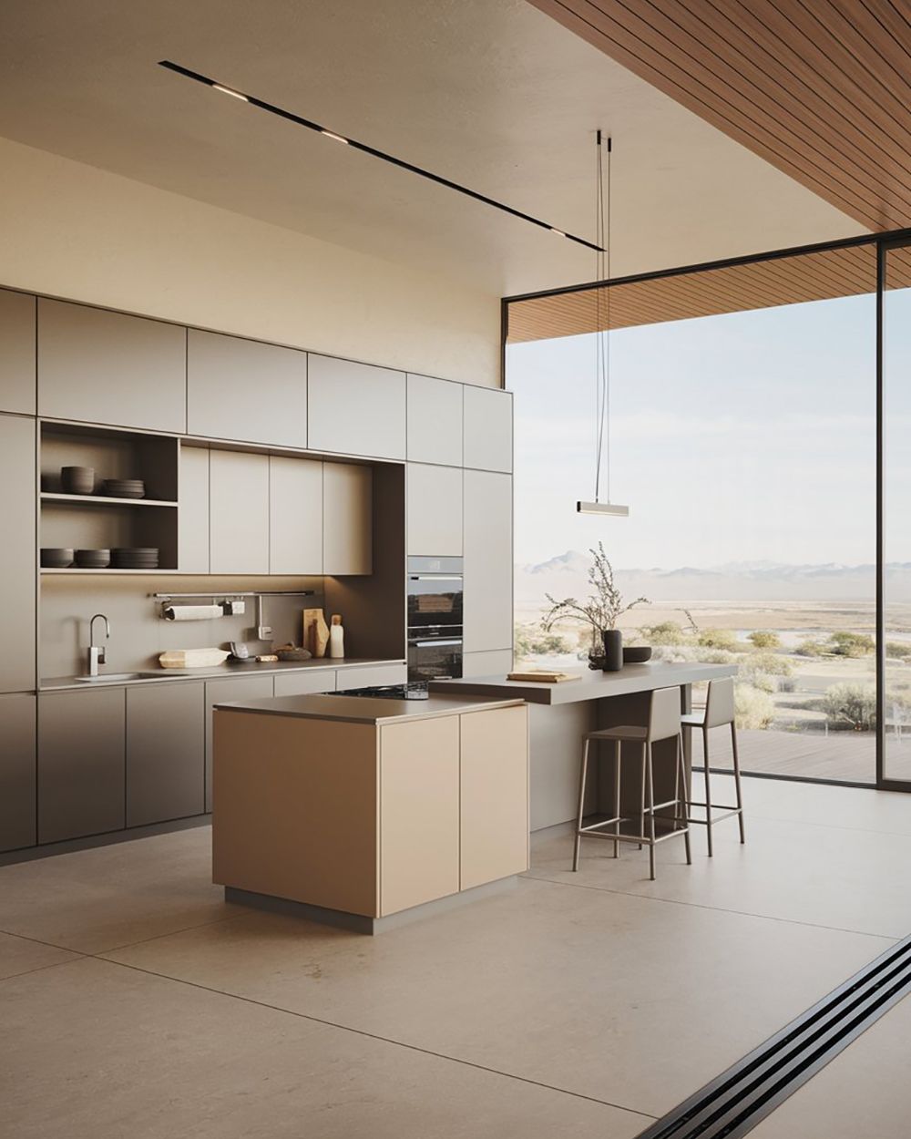 Modern Beige Latte kitchen with greige tall cabinets and built-in appliances next to the island with two stools.