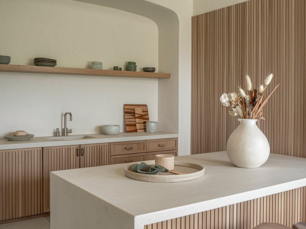 Natural wood and clean lines on a white Corian island create an elegant and functional environment for the best kitchen.