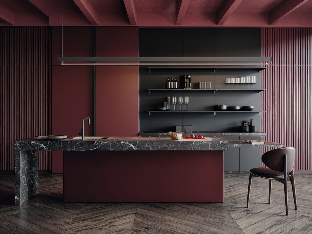 Cuisine Moderne avec une Combinaison de Couleurs Rouge et Noir, un Îlot en Marbre et une Esthétique Minimaliste